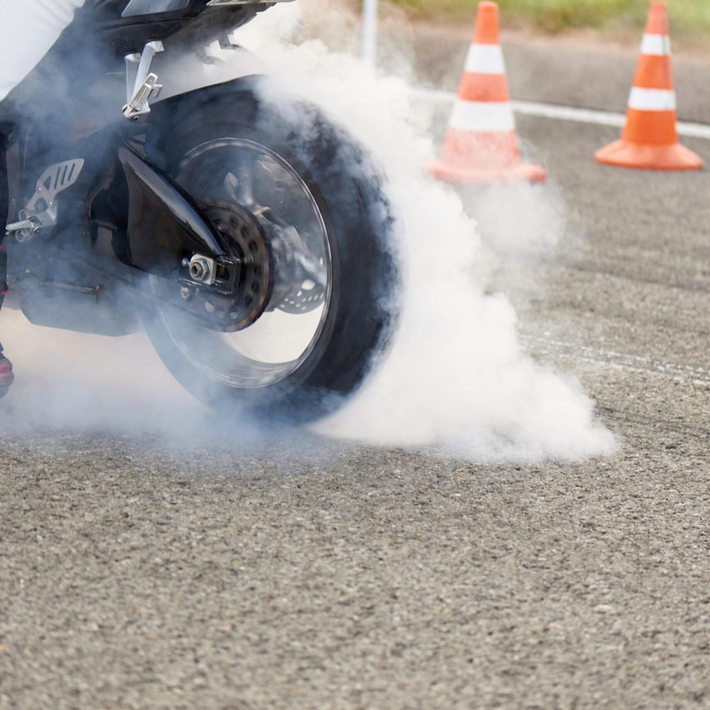 motorcycle-in-smoke-on-the-race-track-2022-01-31-05-12-15-utc-min-scaled-plpa79yev7chi9oza0uk0qxl9a3no0fwhd52sy4k5s